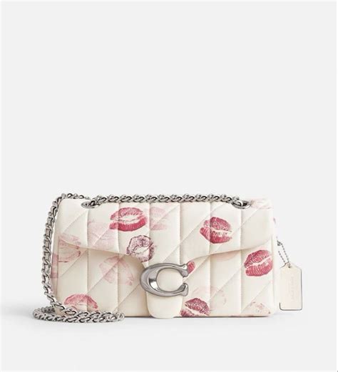 bolsa coach blanca con besos